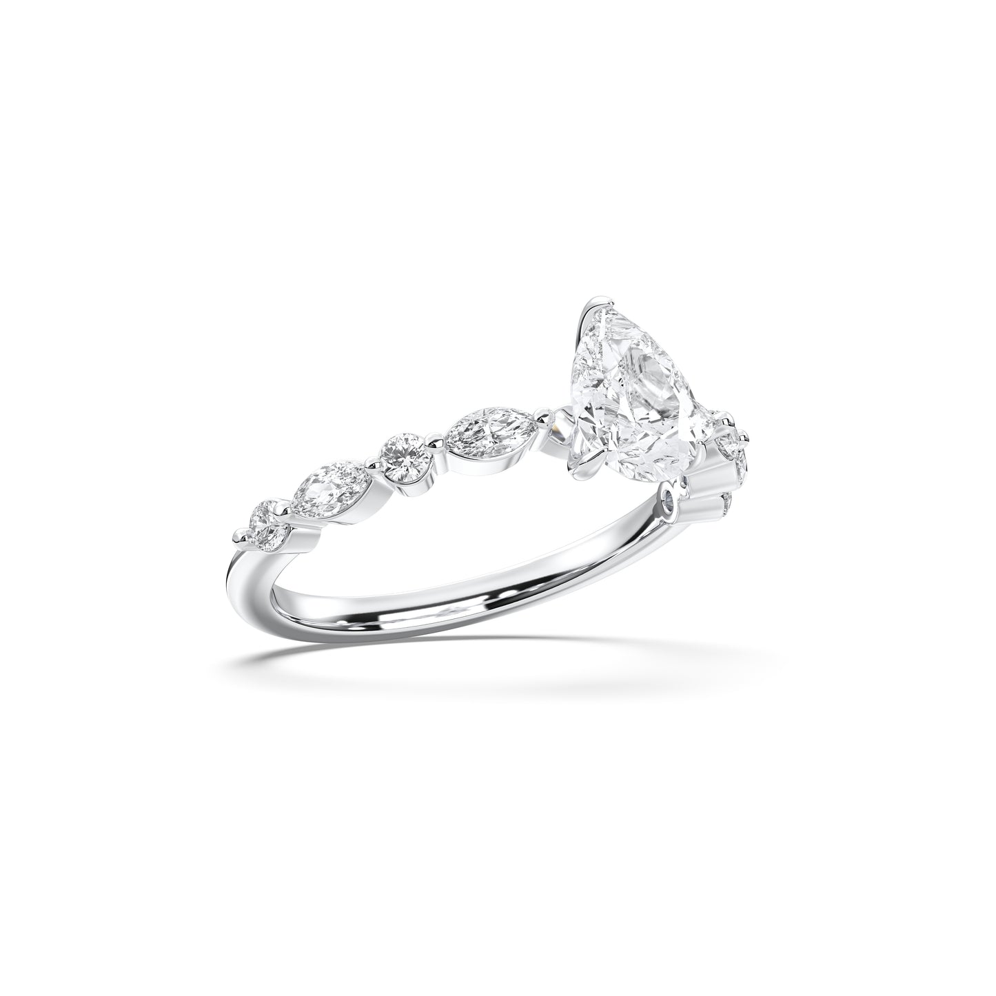 Side stone pear ring