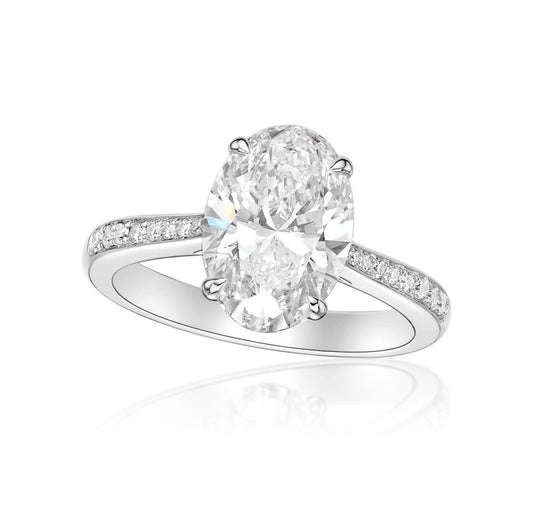 Side stone oval ring